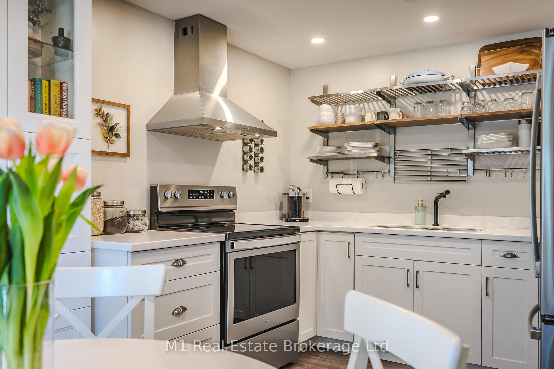 Photo 11 of Unit 8, 129 Victoria Road N, Guelph, Grange Road — HOMEH