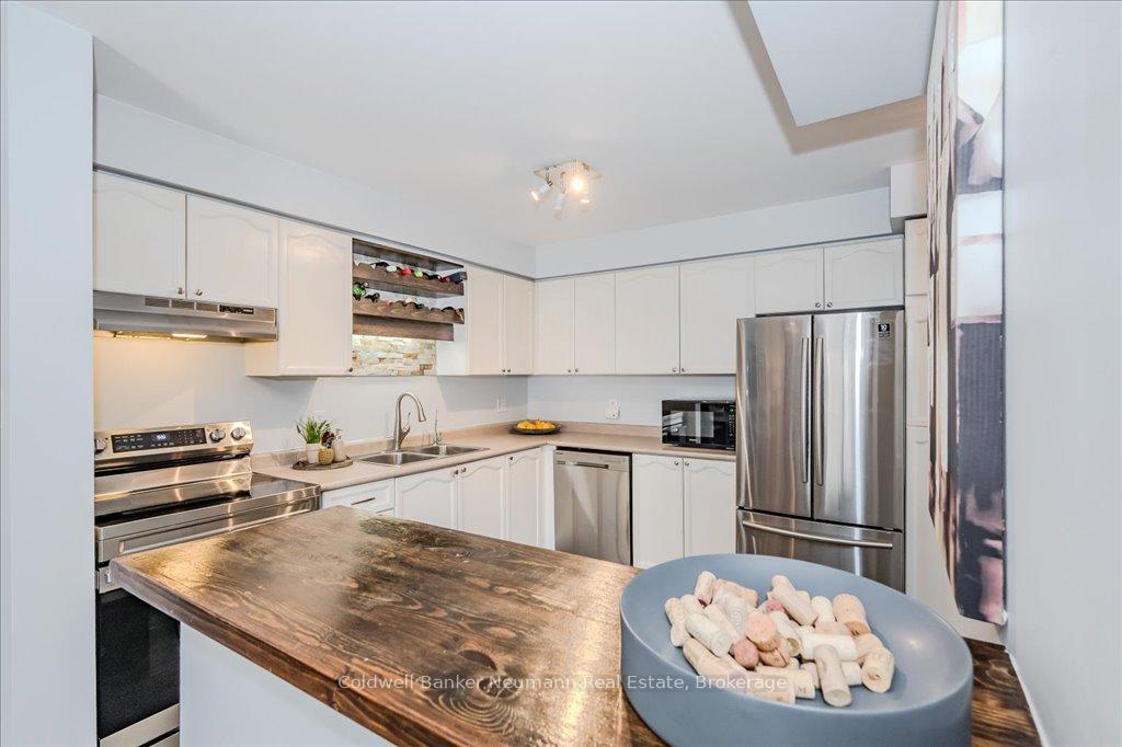 Photo 11 of Unit 4, 920 Edinburgh Road S, Guelph, Kortright West — HOMEH