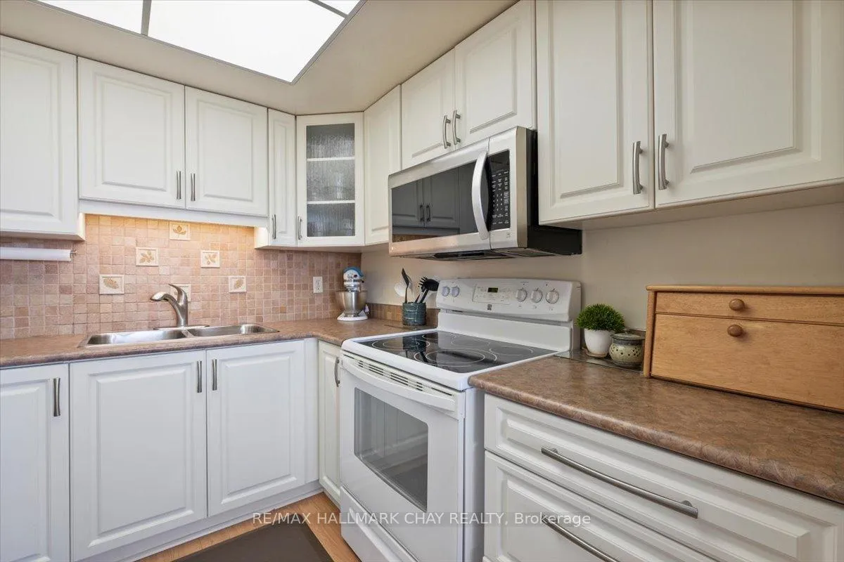 Photo 19 of Unit 403, 65 Ellen Street, Barrie, City Centre — HOMEH