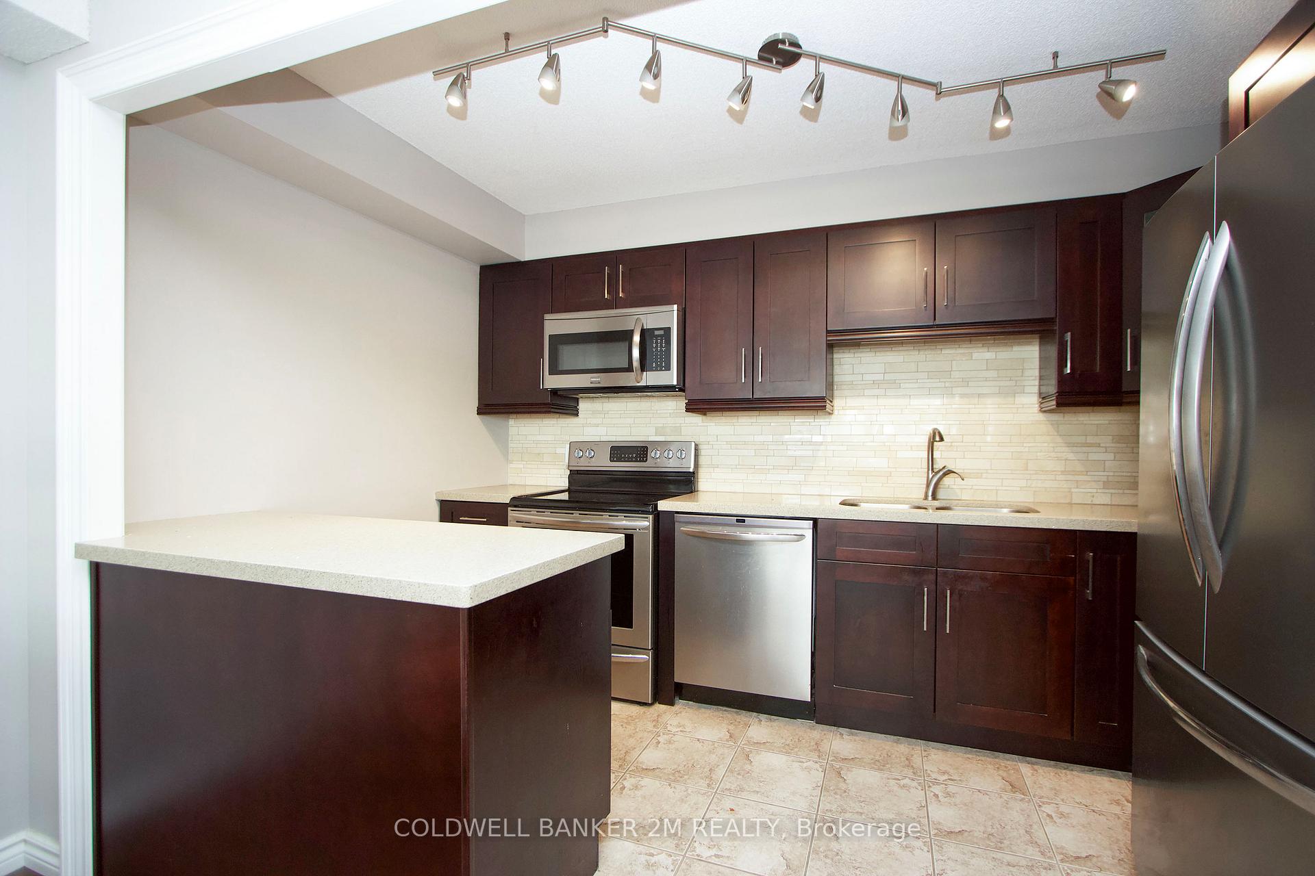 Photo 12 of Unit 518, 50 Richmond Street E, Oshawa, O'Neill — HOMEH