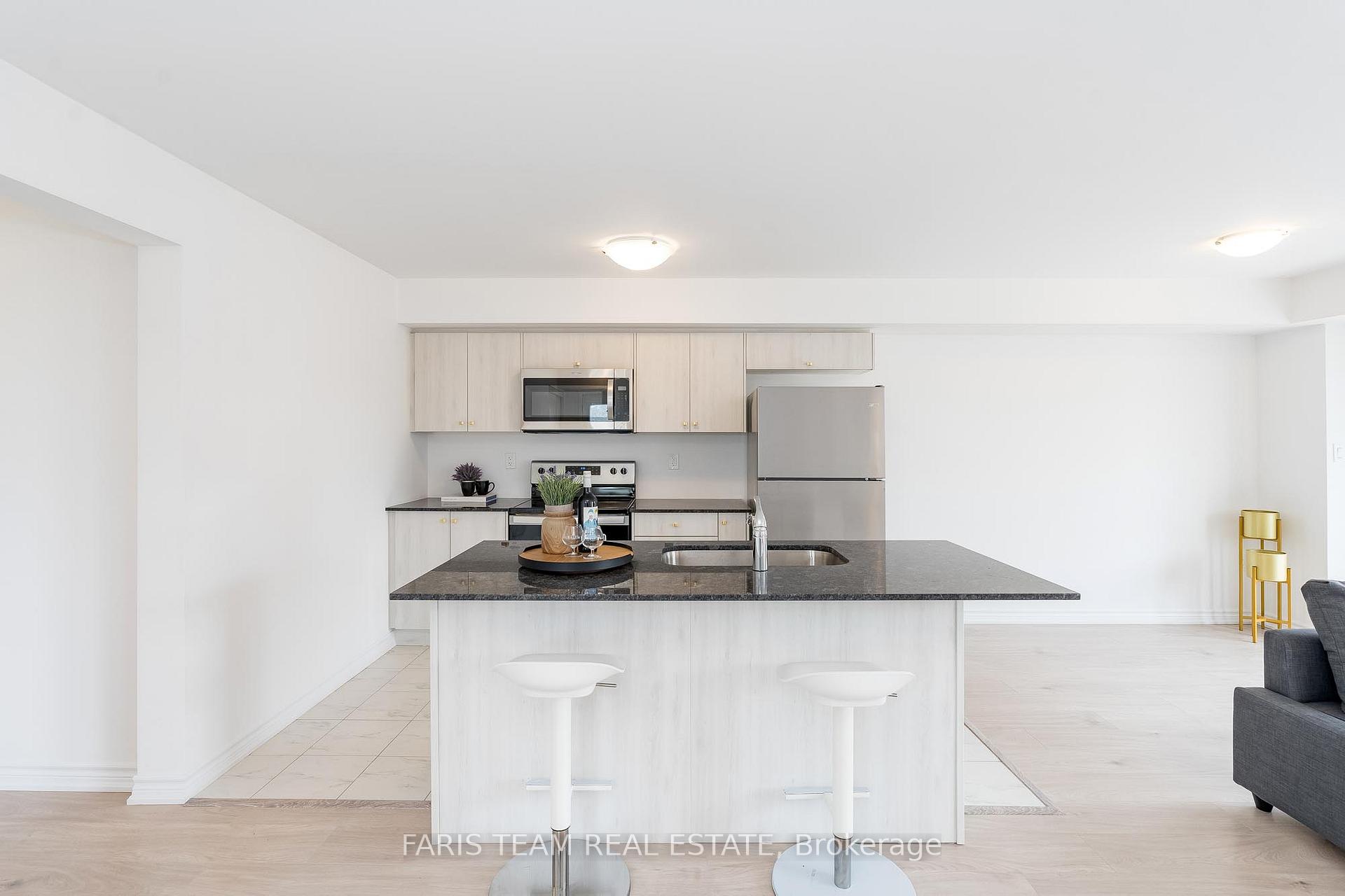 Photo 4 of Unit 2, 31A Pumpkin Corner Crescent, Barrie, Rural Barrie Southeast — HOMEH