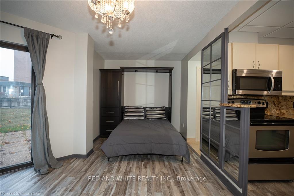 Photo 5 of Unit 103, 10 Ellen Street E, Kitchener — HOMEH