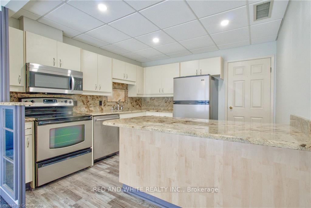 Photo 11 of Unit 103, 10 Ellen Street E, Kitchener — HOMEH