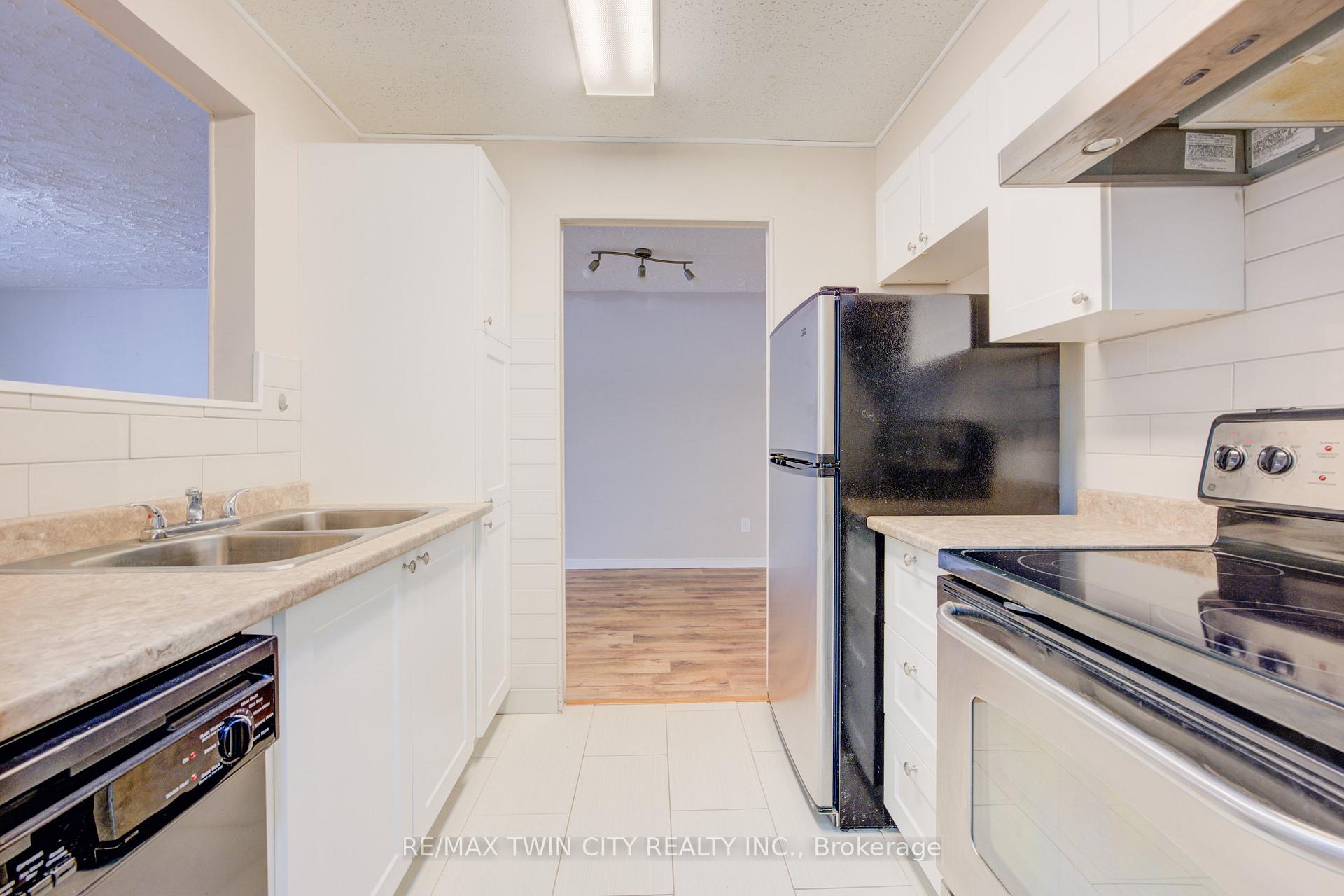 Photo 6 of Unit 202, 24 Mooregate Crescent, Kitchener — HOMEH