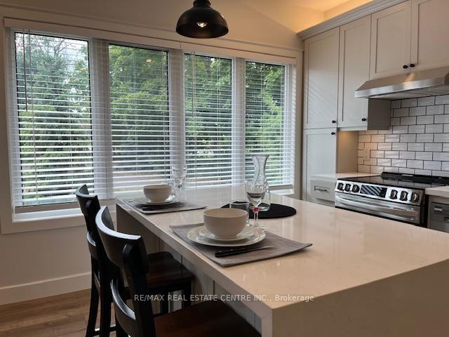 Photo 2 of Unit 2, 9703 Dundas Street E, Erin, Rural Erin — HOMEH