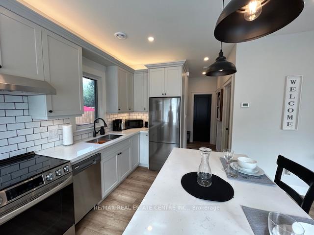 Photo 3 of Unit 2, 9703 Dundas Street E, Erin, Rural Erin — HOMEH