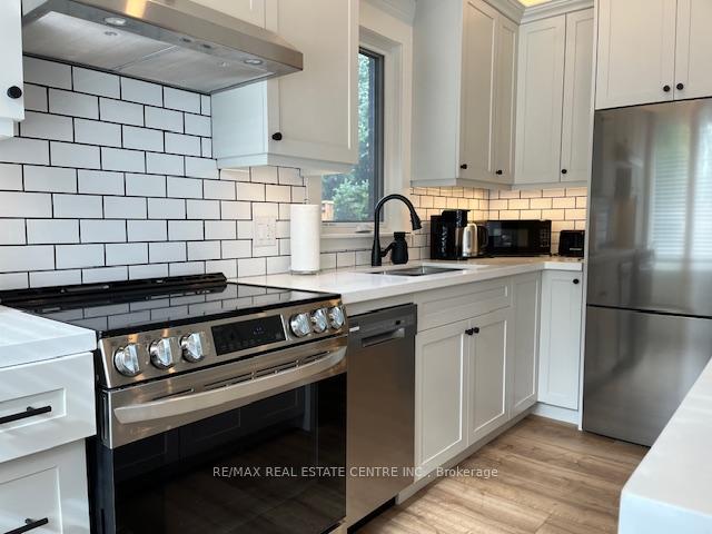 Photo 4 of Unit 2, 9703 Dundas Street E, Erin, Rural Erin — HOMEH