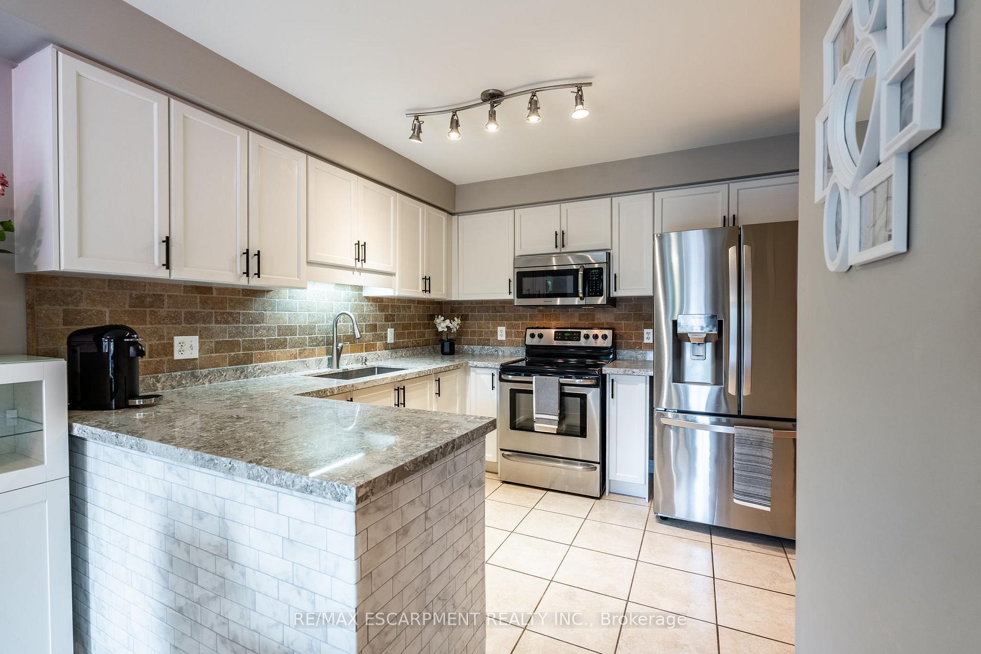 Photo 17 of Unit 6, 1461 Upper Gage Avenue, Hamilton, Templemead — HOMEH