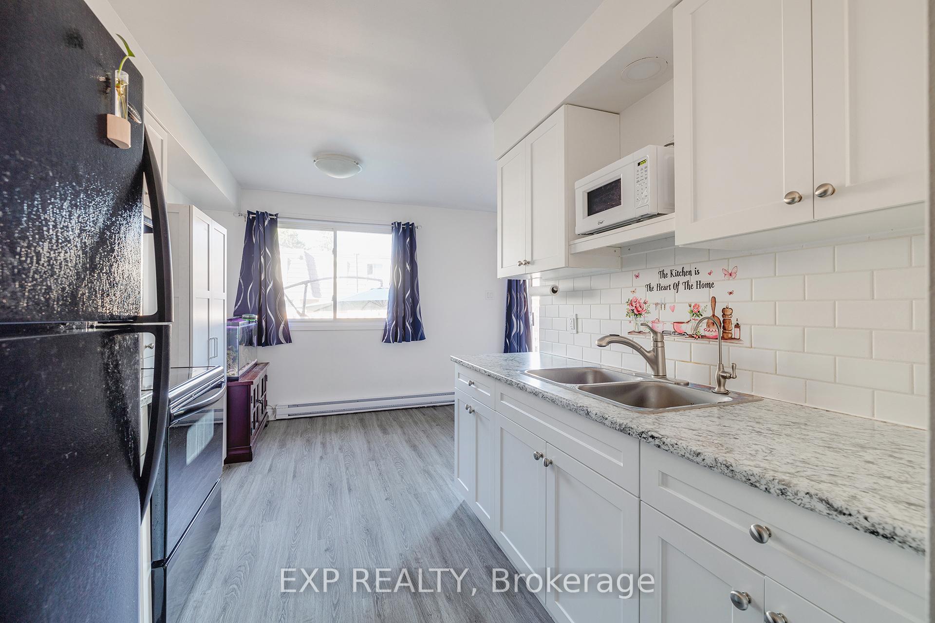 Photo 7 of Unit 5, 320 Traynor Avenue, Kitchener — HOMEH