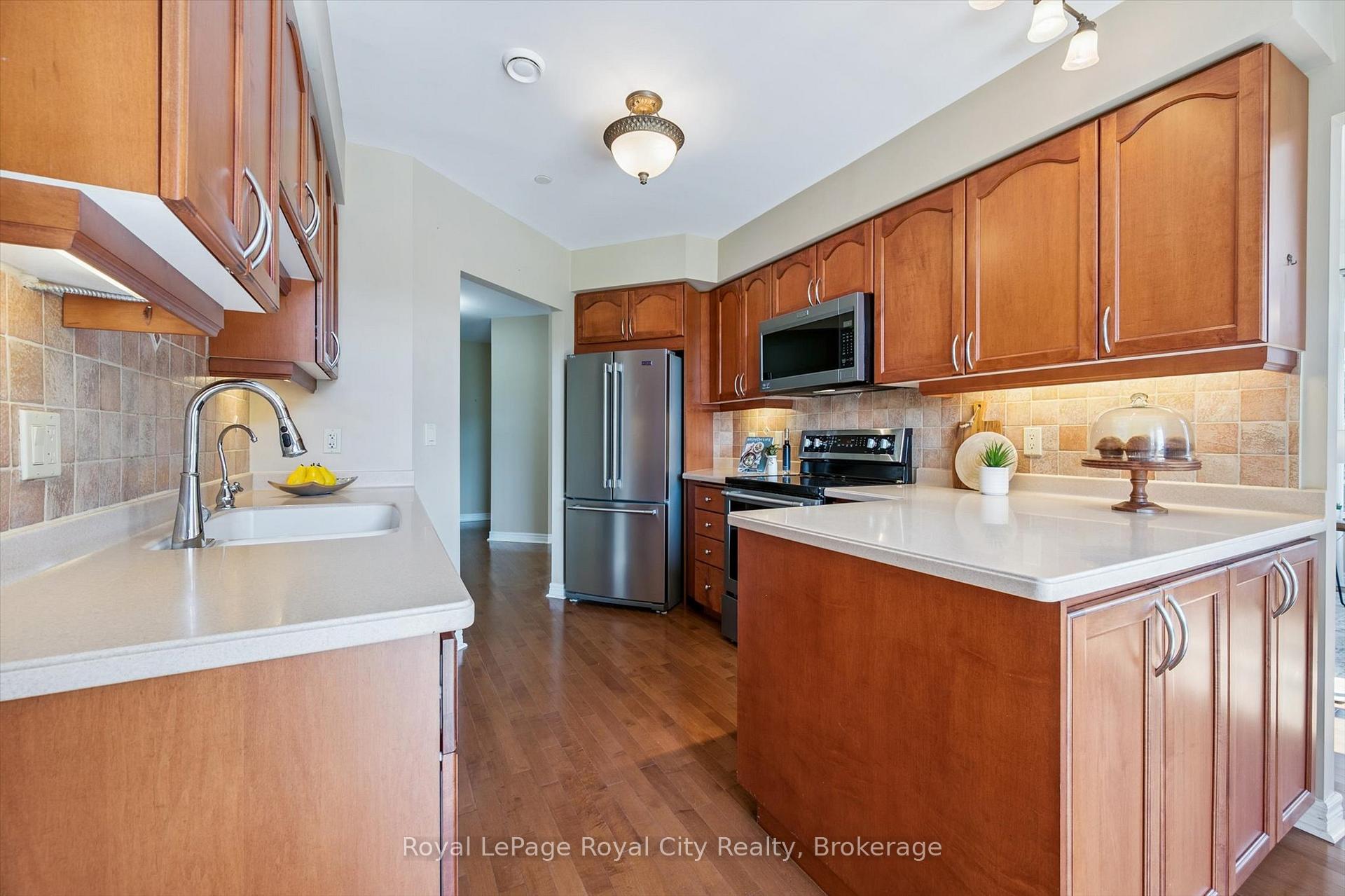 Photo 9 of Unit D205, 71 Bayberry Drive, Guelph, Village By The Arboretum — HOMEH