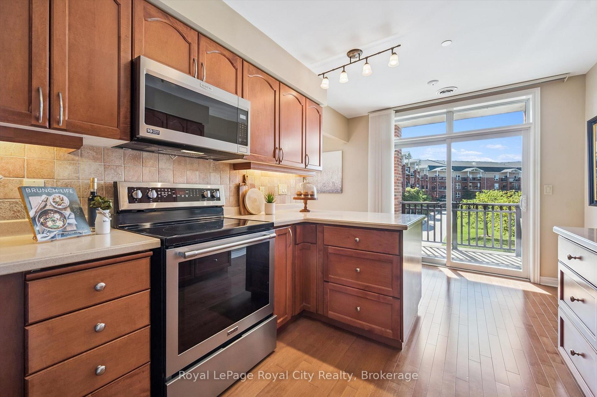 Photo 11 of Unit D205, 71 Bayberry Drive, Guelph, Village By The Arboretum — HOMEH