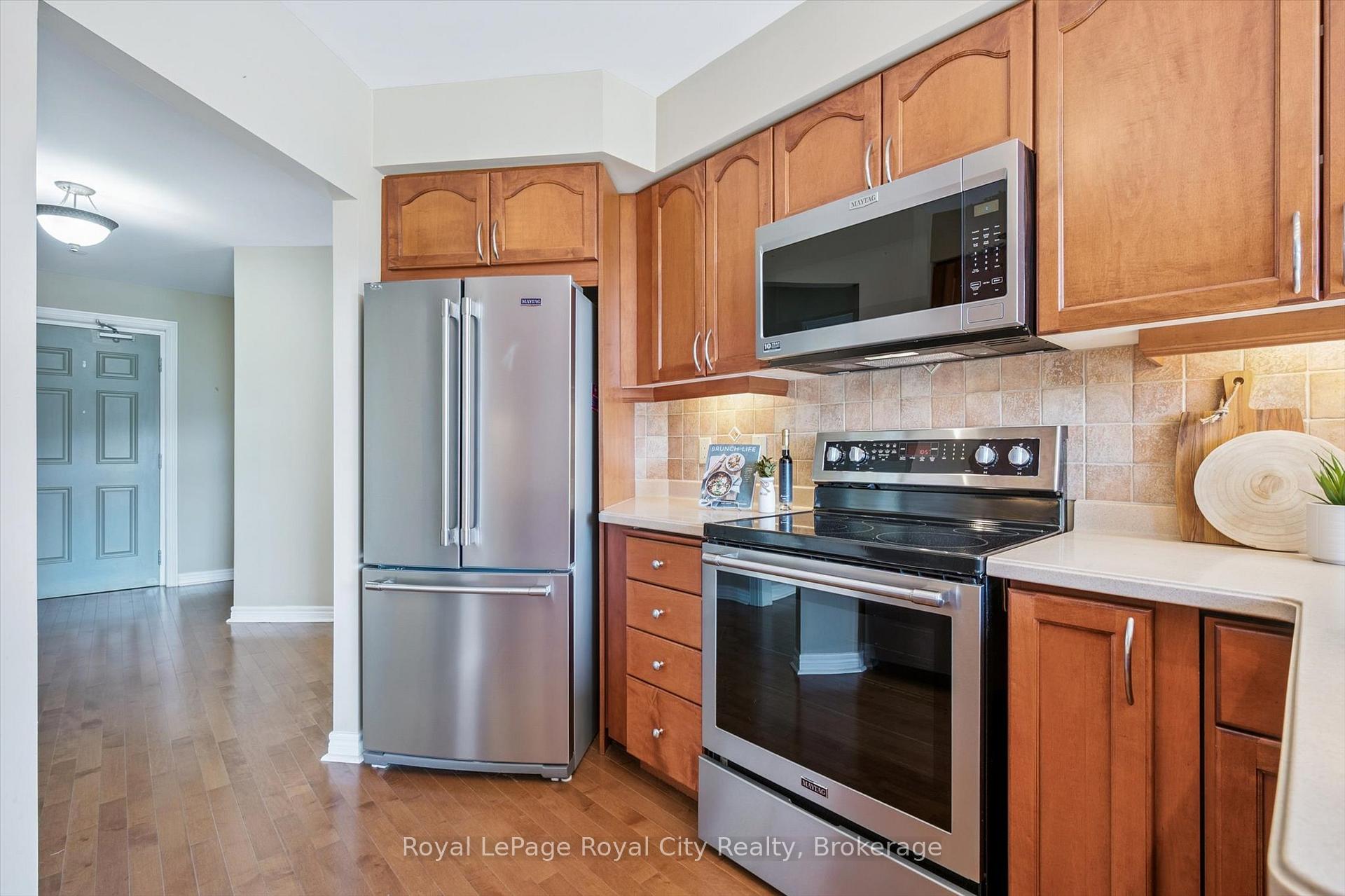 Photo 12 of Unit D205, 71 Bayberry Drive, Guelph, Village By The Arboretum — HOMEH