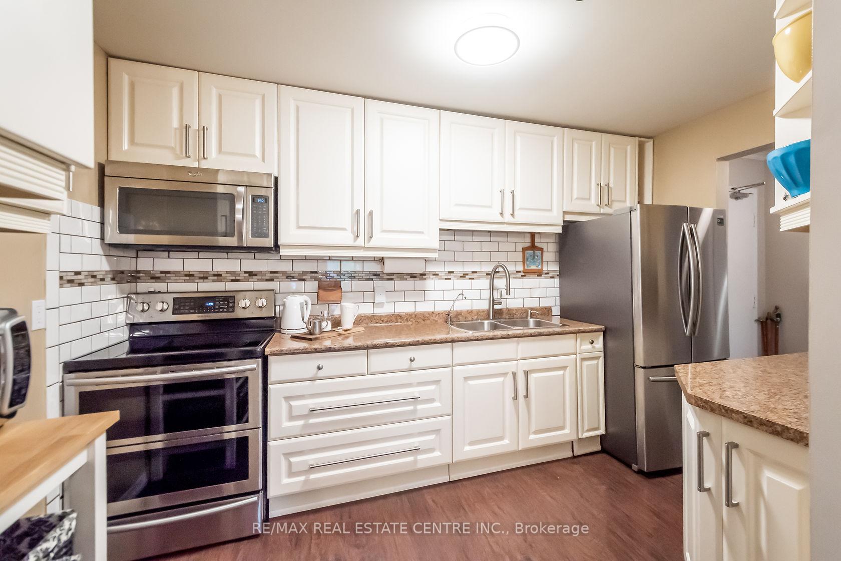 Photo 18 of Unit 105, 6 Niagara Street, Grimsby, Grimsby West — HOMEH