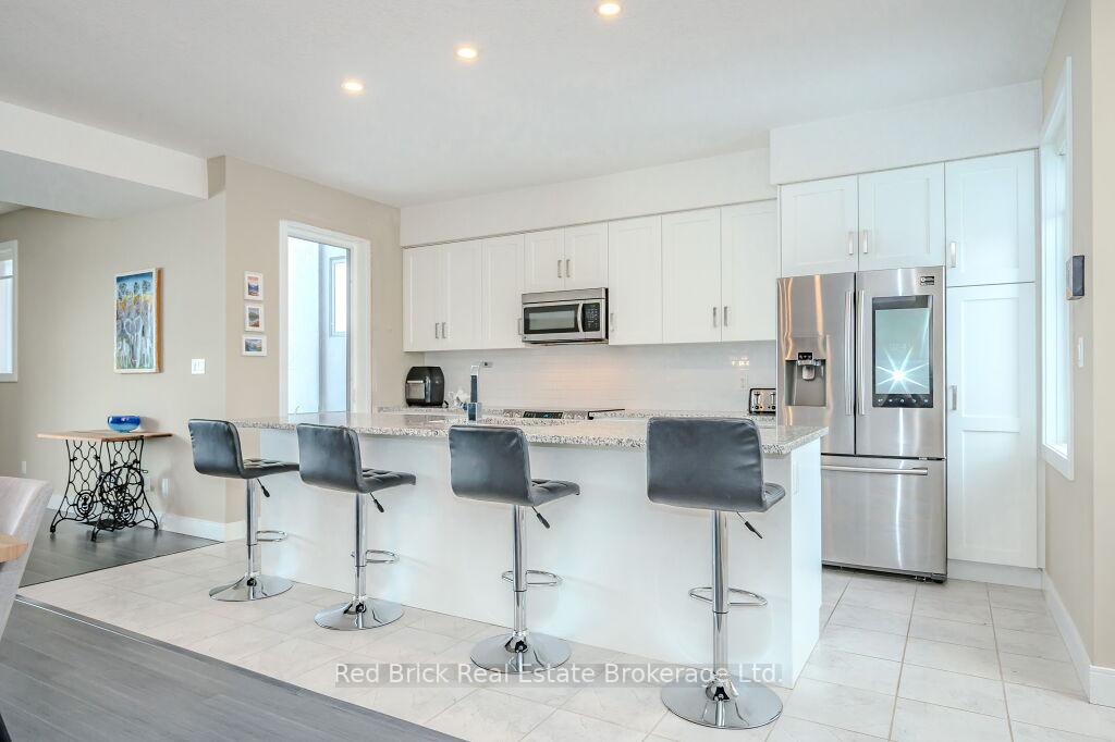 Photo 2 of Unit 20, 32 Arkell Road, Guelph, Kortright East — HOMEH