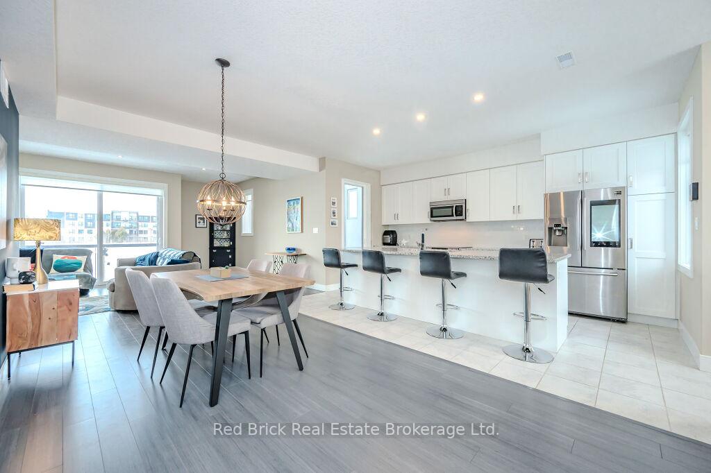 Photo 3 of Unit 20, 32 Arkell Road, Guelph, Kortright East — HOMEH