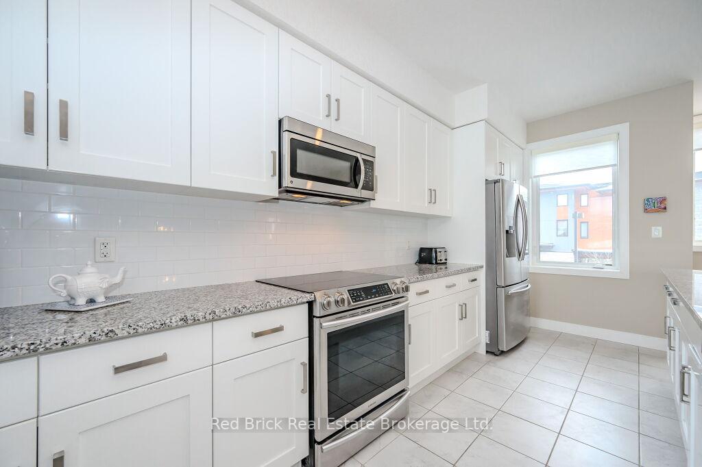 Photo 6 of Unit 20, 32 Arkell Road, Guelph, Kortright East — HOMEH