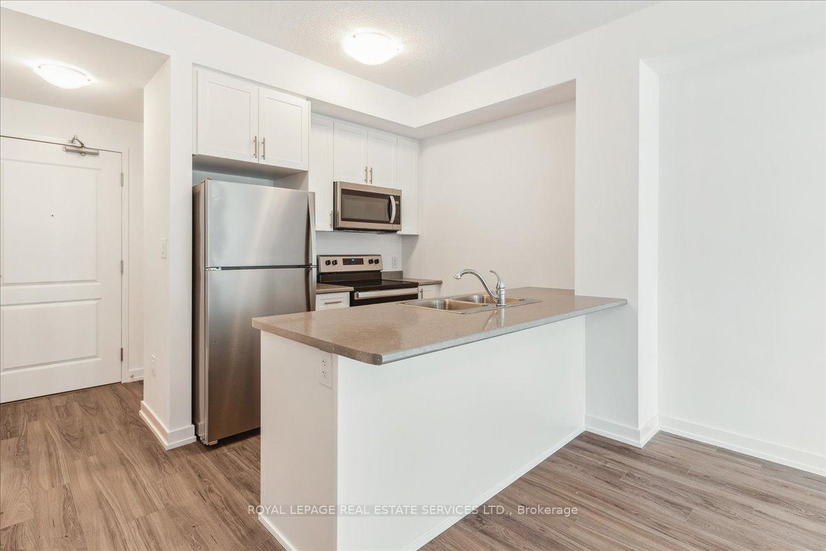 Photo 10 of Unit 423, 460 Dundas Street E, Hamilton, Waterdown — HOMEH