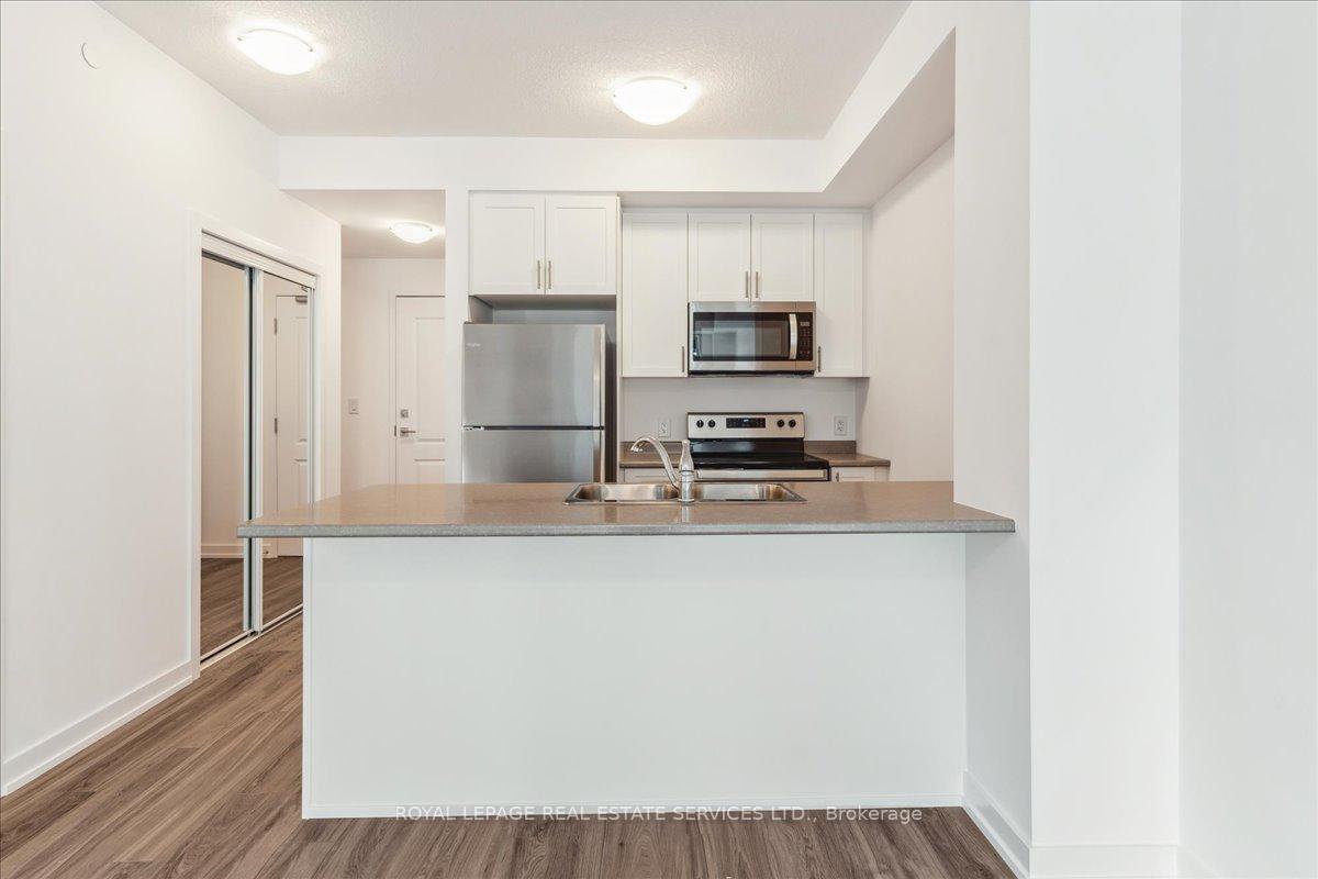 Photo 11 of Unit 423, 460 Dundas Street E, Hamilton, Waterdown — HOMEH