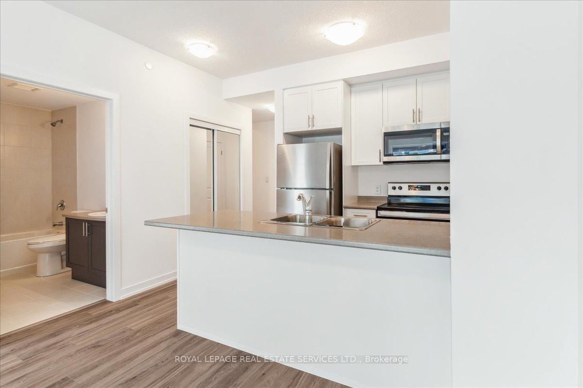 Photo 12 of Unit 423, 460 Dundas Street E, Hamilton, Waterdown — HOMEH
