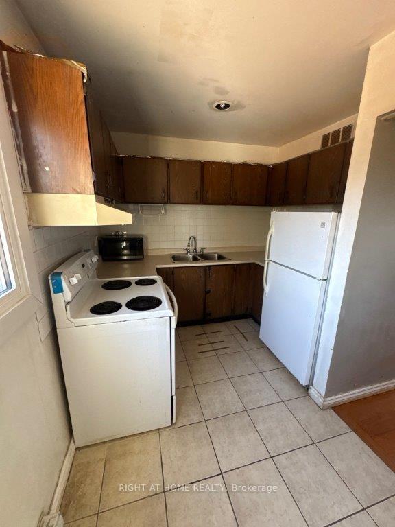 Photo 7 of Unit 5, 1209 Queen Street E, Toronto, South Riverdale — HOMEH