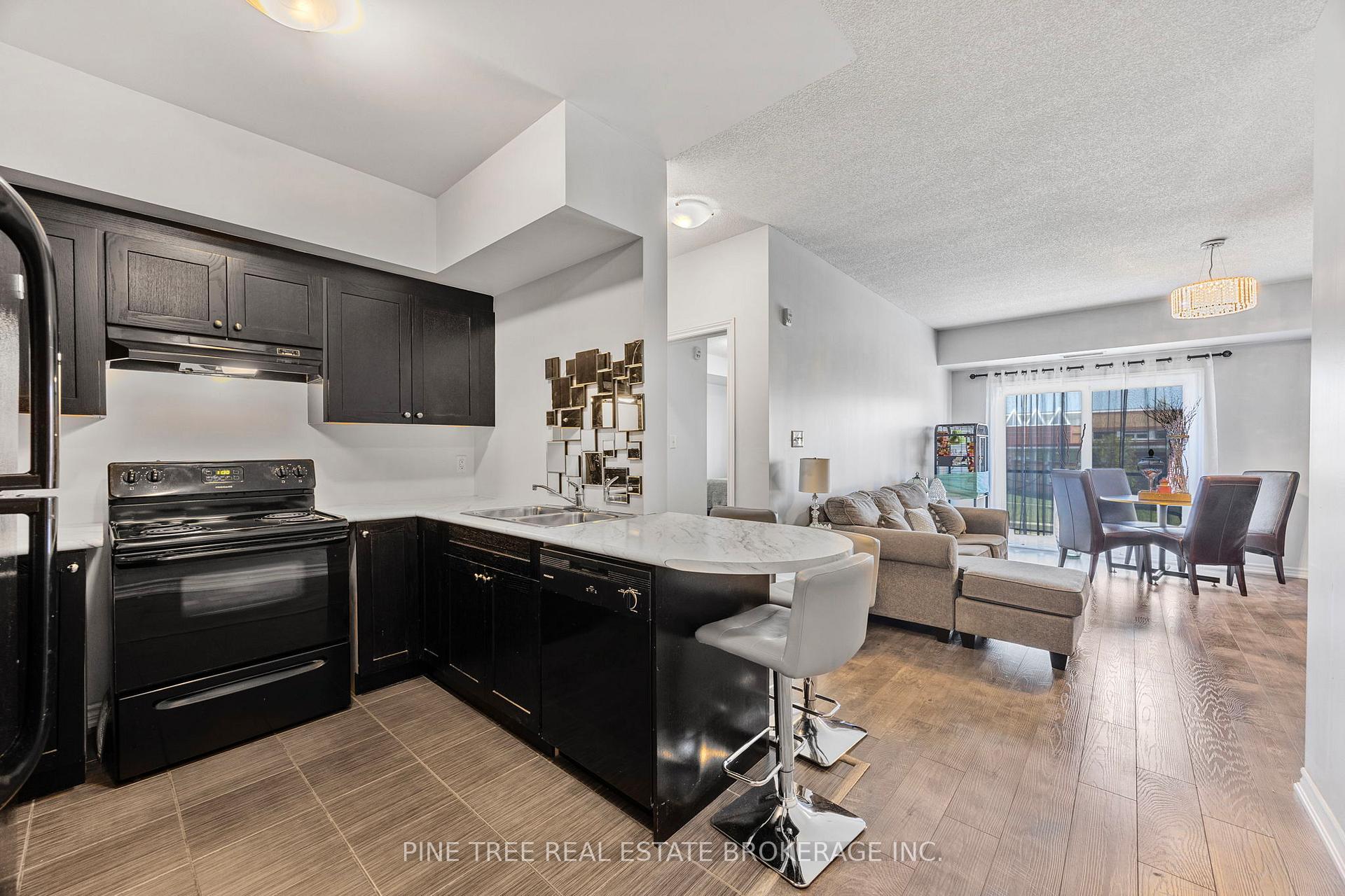 Photo 7 of Unit 205, 720 Yonge Street, Barrie, Painswick South — HOMEH