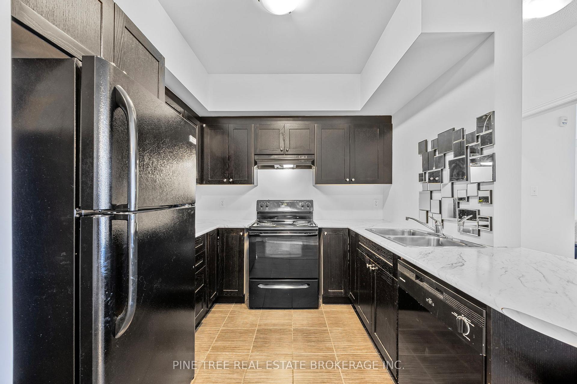 Photo 9 of Unit 205, 720 Yonge Street, Barrie, Painswick South — HOMEH