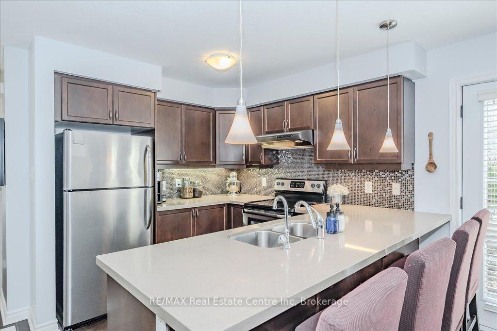 Photo 1 of Unit 16, 100 Frederick Drive, Guelph, Pineridge/Westminster Woods — HOMEH