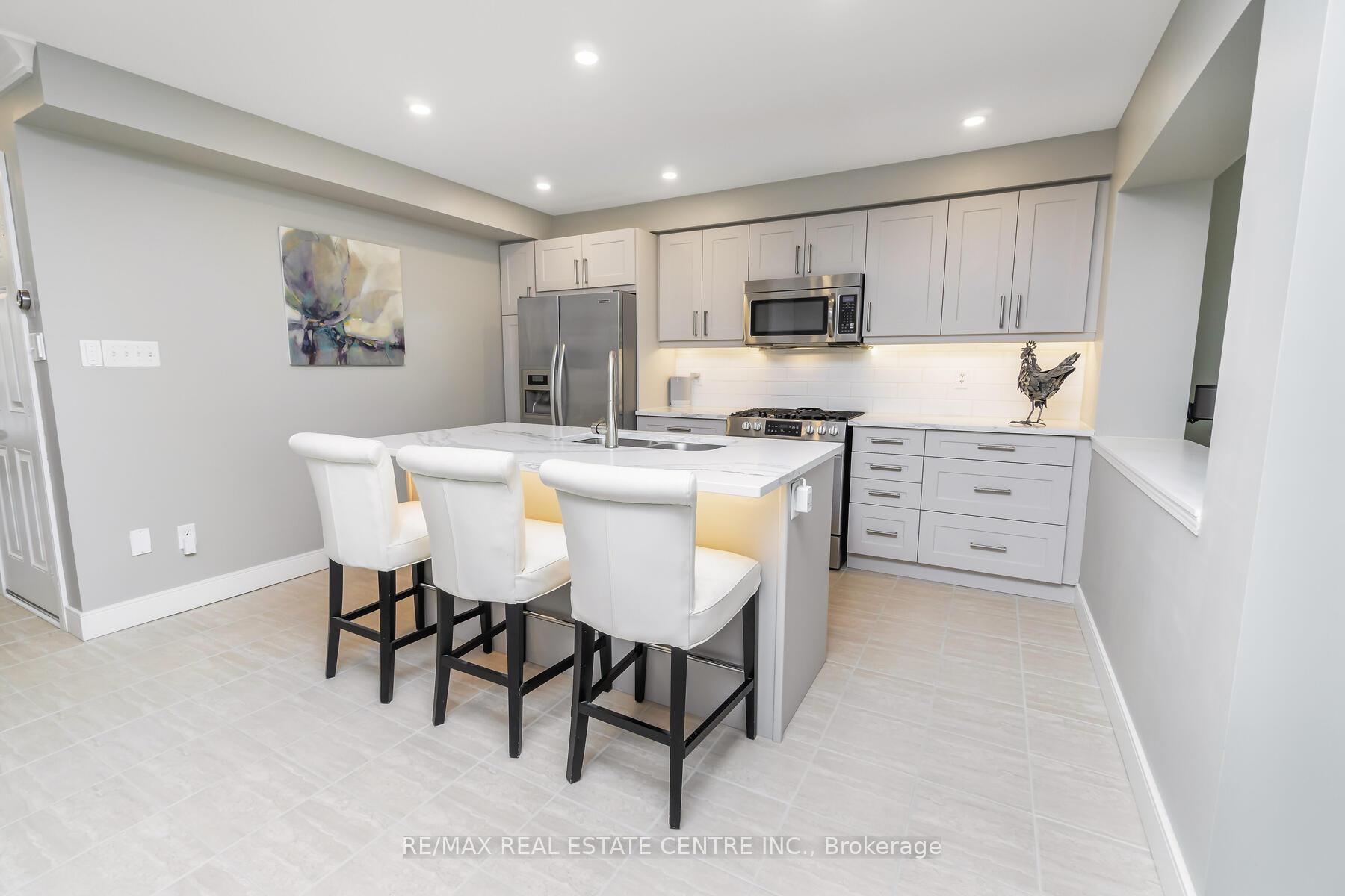 Photo 5 of Unit 21, 1035 Victoria Road S, Guelph, Kortright East — HOMEH