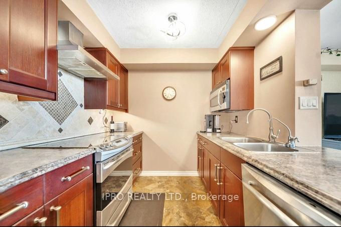 Photo 6 of Unit 1401, 225 Harvard Place, Waterloo — HOMEH
