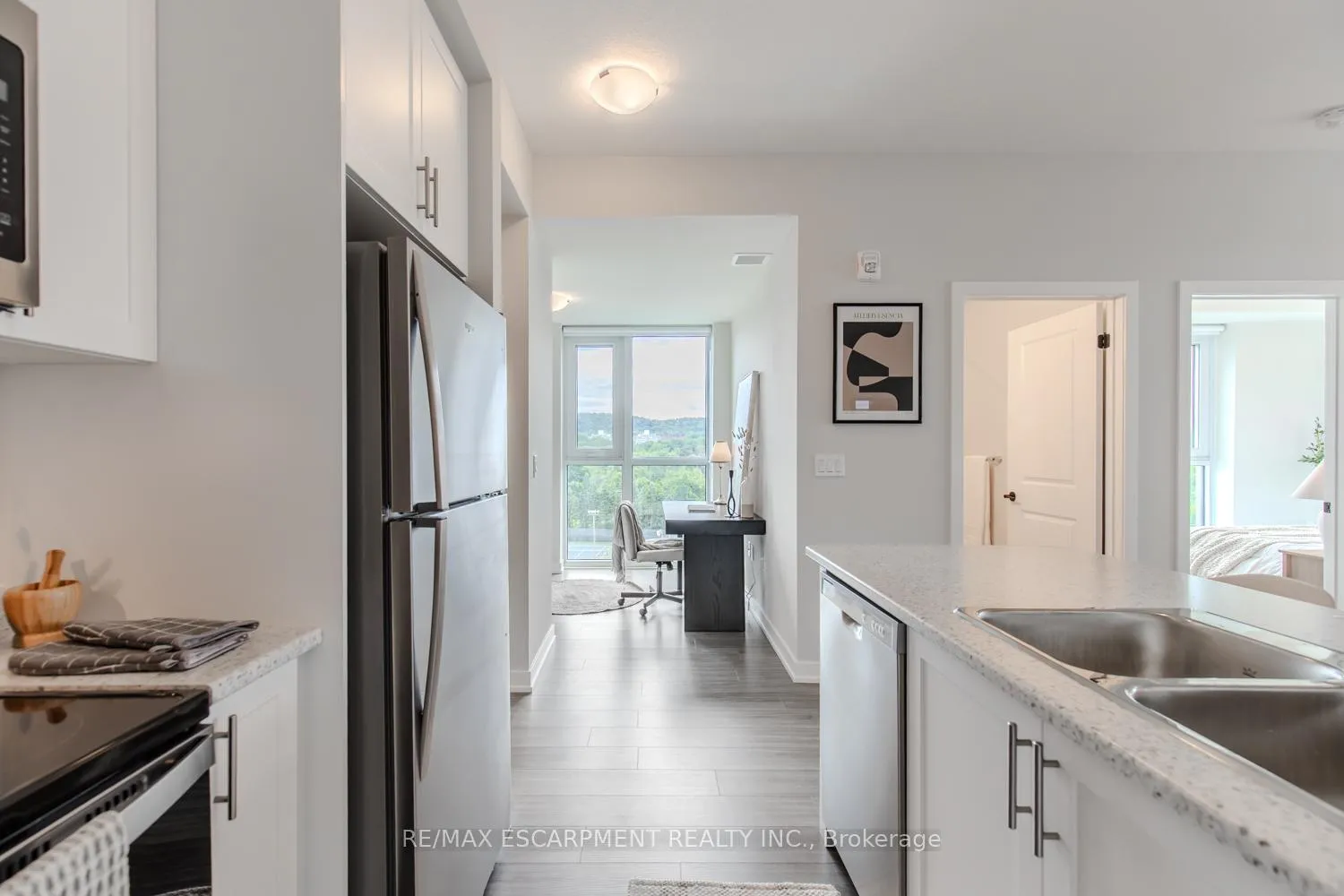 Photo 11 of Unit 1106, 870 Queenston Road, Hamilton, Stoney Creek — HOMEH