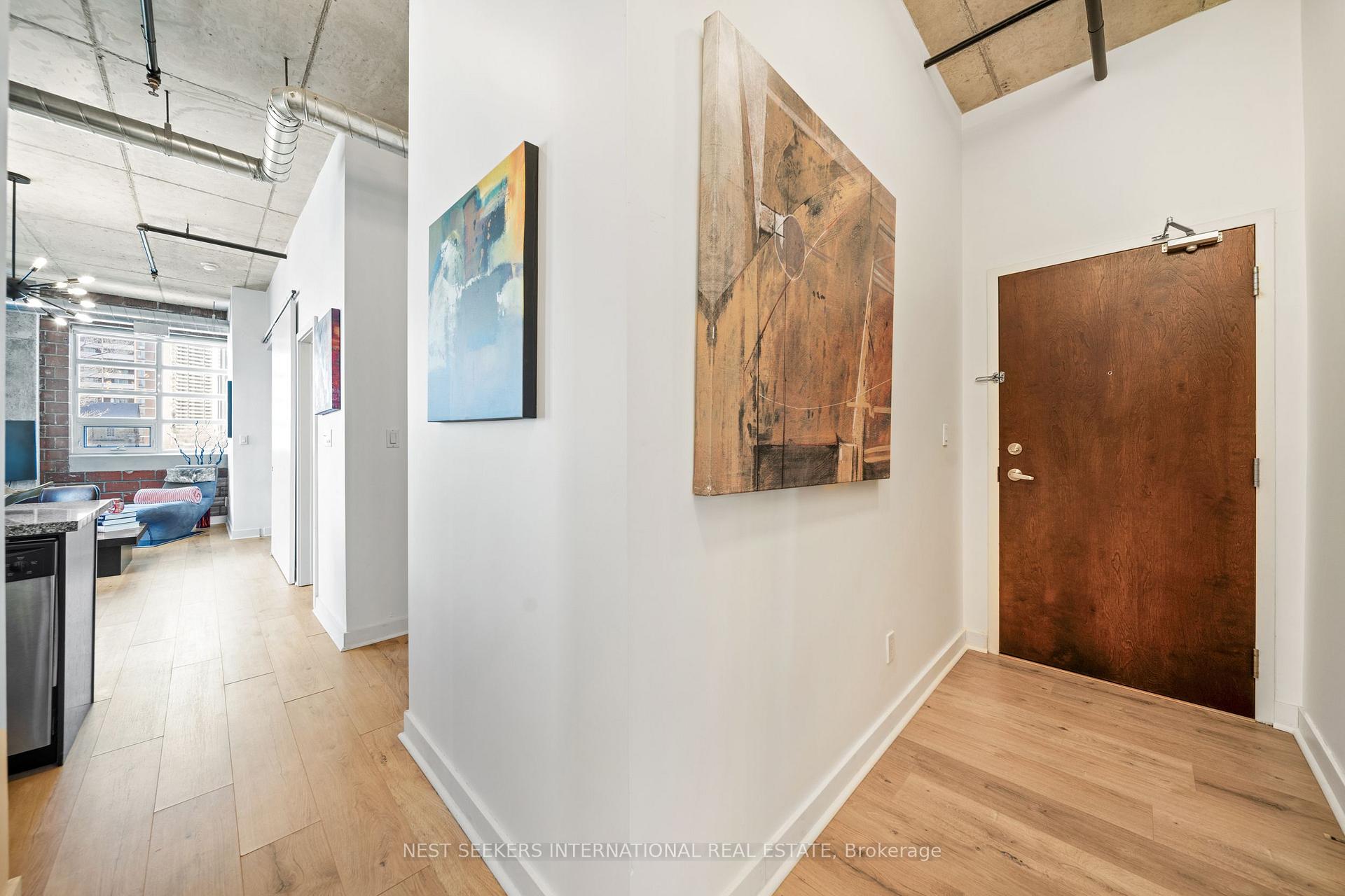 Photo 5 of Unit 302, 10 Wellesley Place, Toronto, North St. James Town — HOMEH