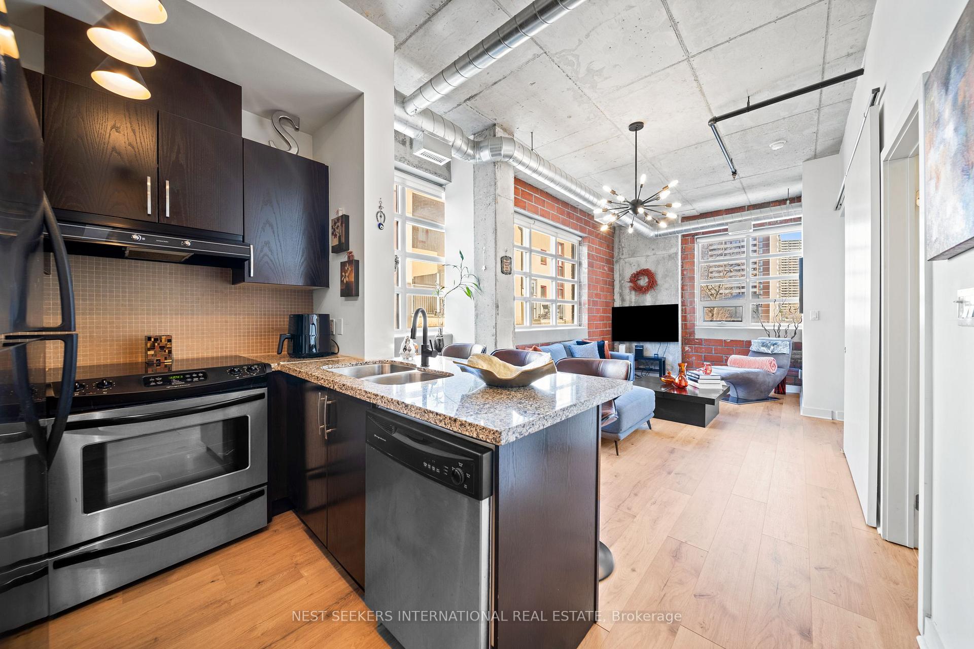 Photo 6 of Unit 302, 10 Wellesley Place, Toronto, North St. James Town — HOMEH