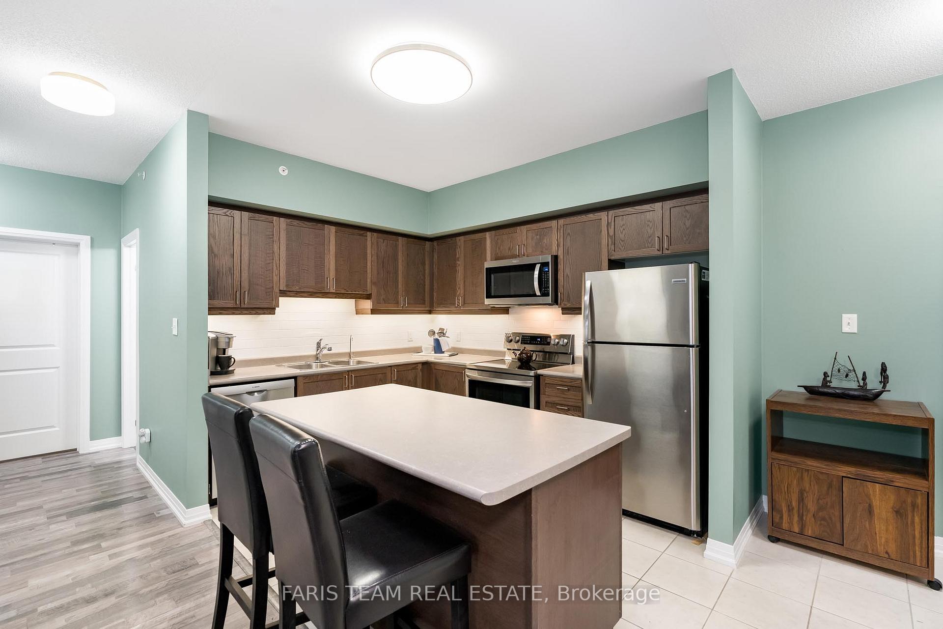 Photo 4 of Unit 406, 161 Wellington Street E, New Tecumseth, Alliston — HOMEH