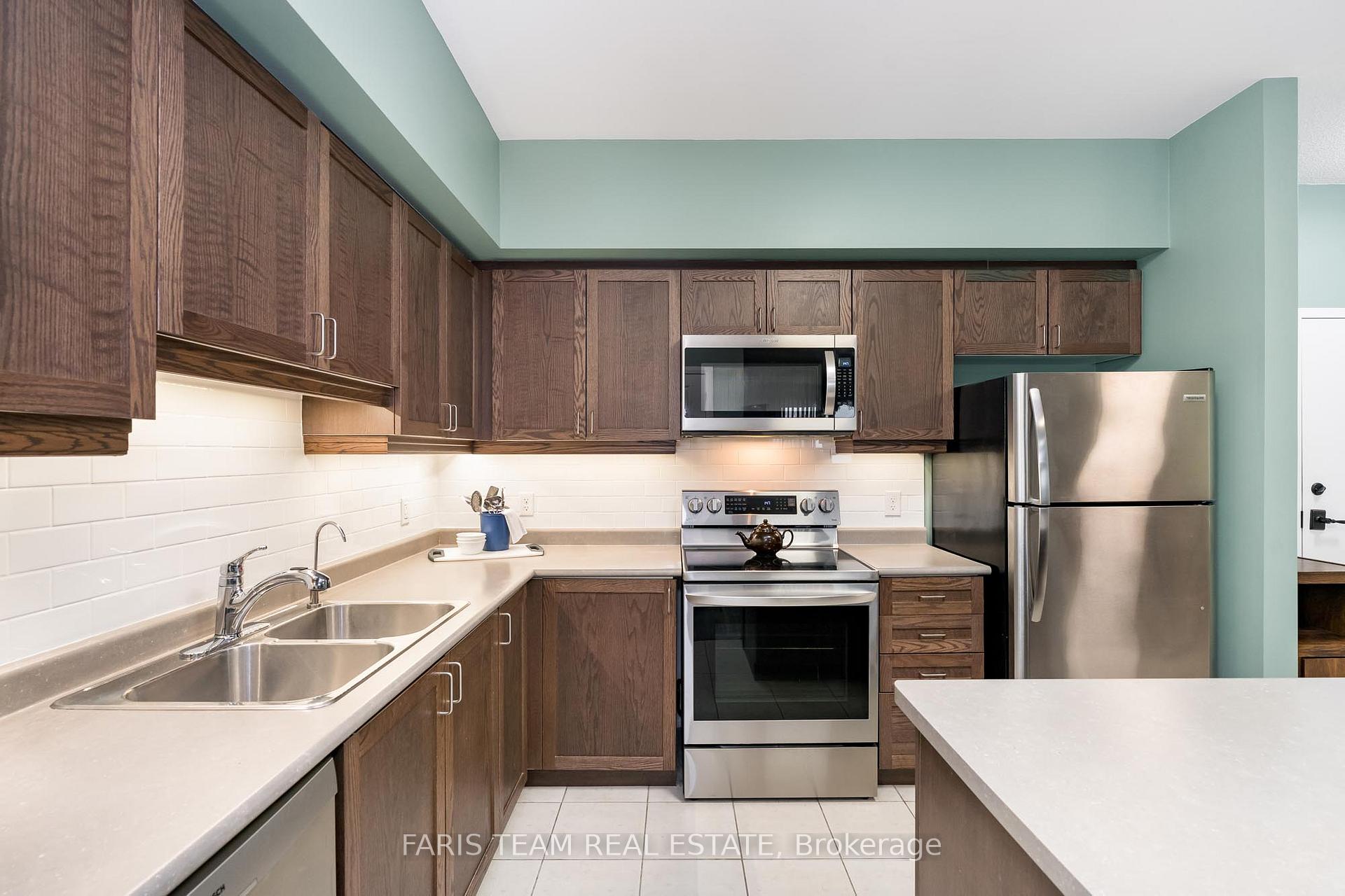 Photo 5 of Unit 406, 161 Wellington Street E, New Tecumseth, Alliston — HOMEH