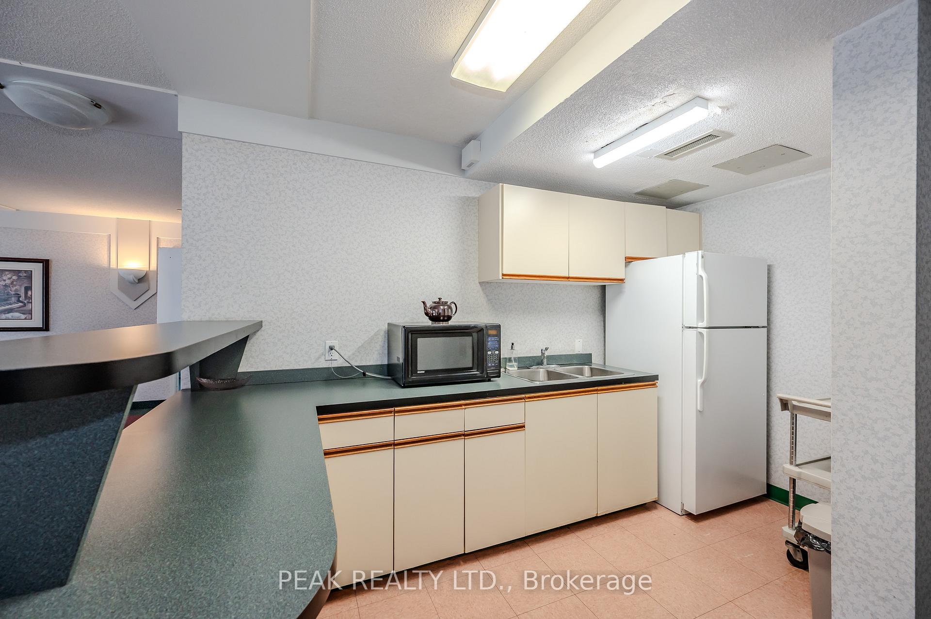Photo 31 of Unit 208, 10 Ellen Street E, Kitchener — HOMEH