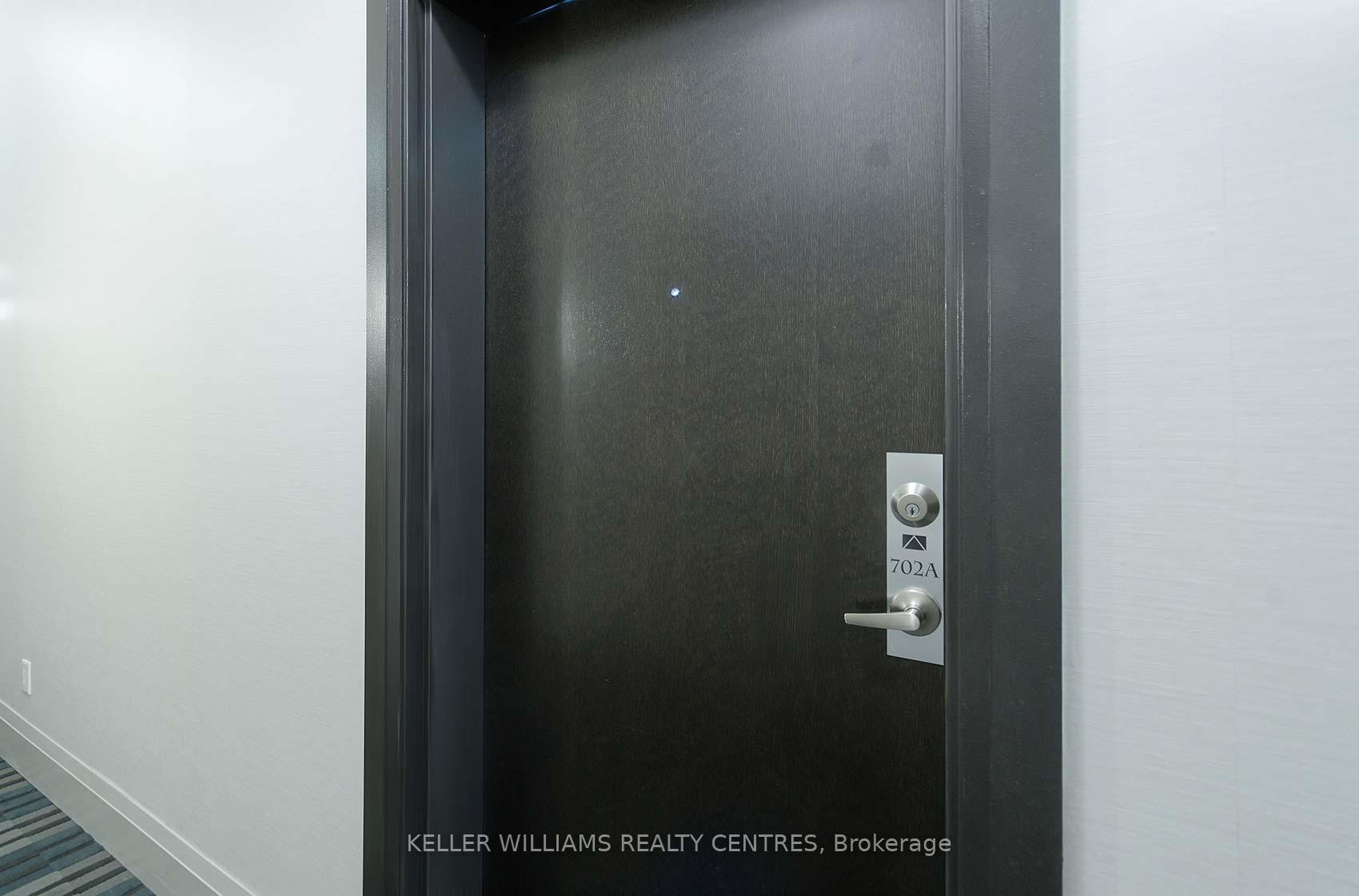 Photo 4 of Unit 702A, 15277 Yonge Street, Aurora, Aurora Village — HOMEH