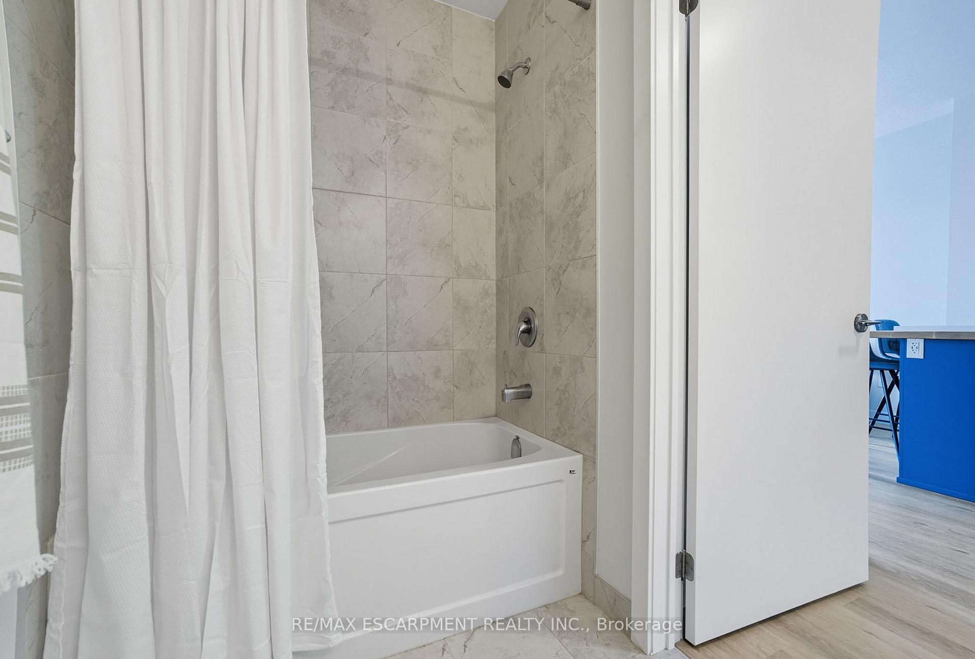 Photo 22 of Unit 204, 600 North Service Road, Hamilton, Lakeshore — HOMEH
