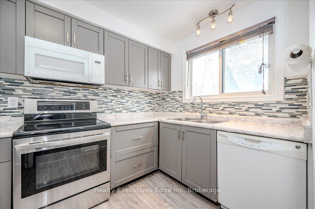 Photo 10 of Unit 7, 41 Rhonda Road, Guelph, Willow West/Sugarbush/West Acres — HOMEH