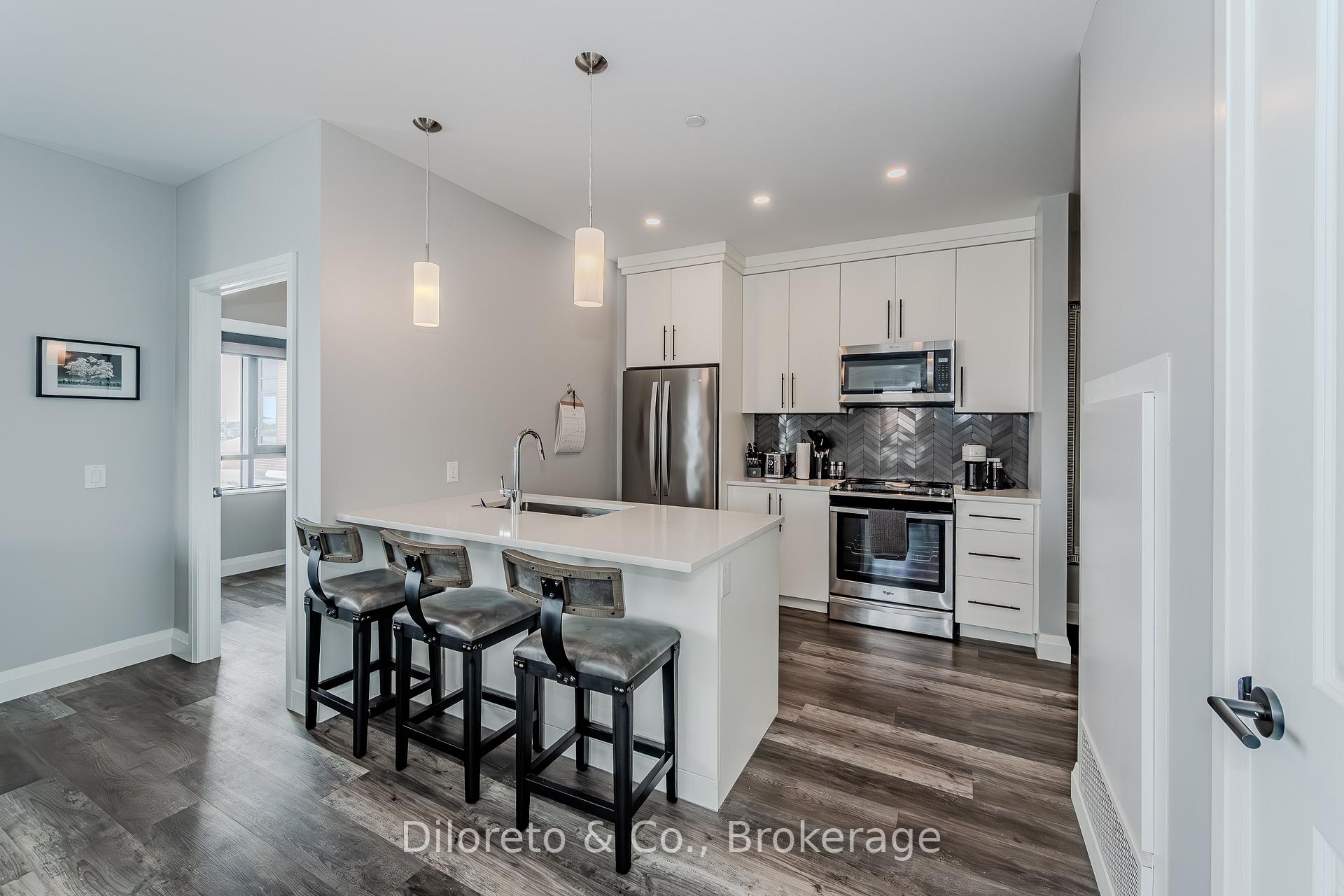 Photo 1 of Unit 215, 332 Gosling Gardens, Guelph, Clairfields/Hanlon Business Park — HOMEH