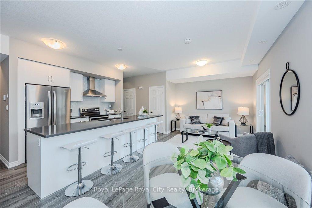 Photo 1 of Unit 52, 107 Westra Drive, Guelph, Willow West/Sugarbush/West Acres — HOMEH