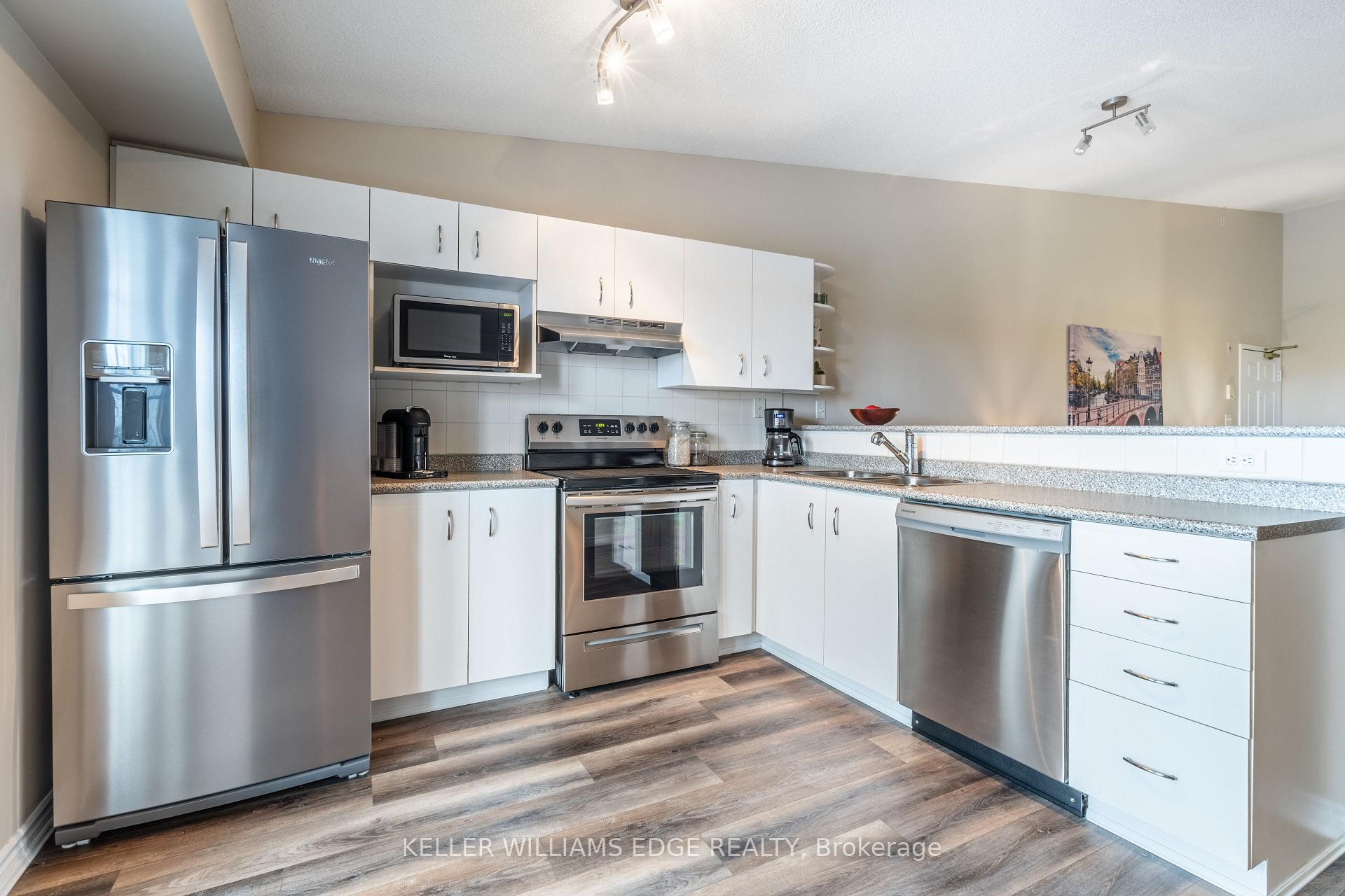 Photo 12 of Unit 407, 1411 Walker's Line, Burlington, Tansley — HOMEH