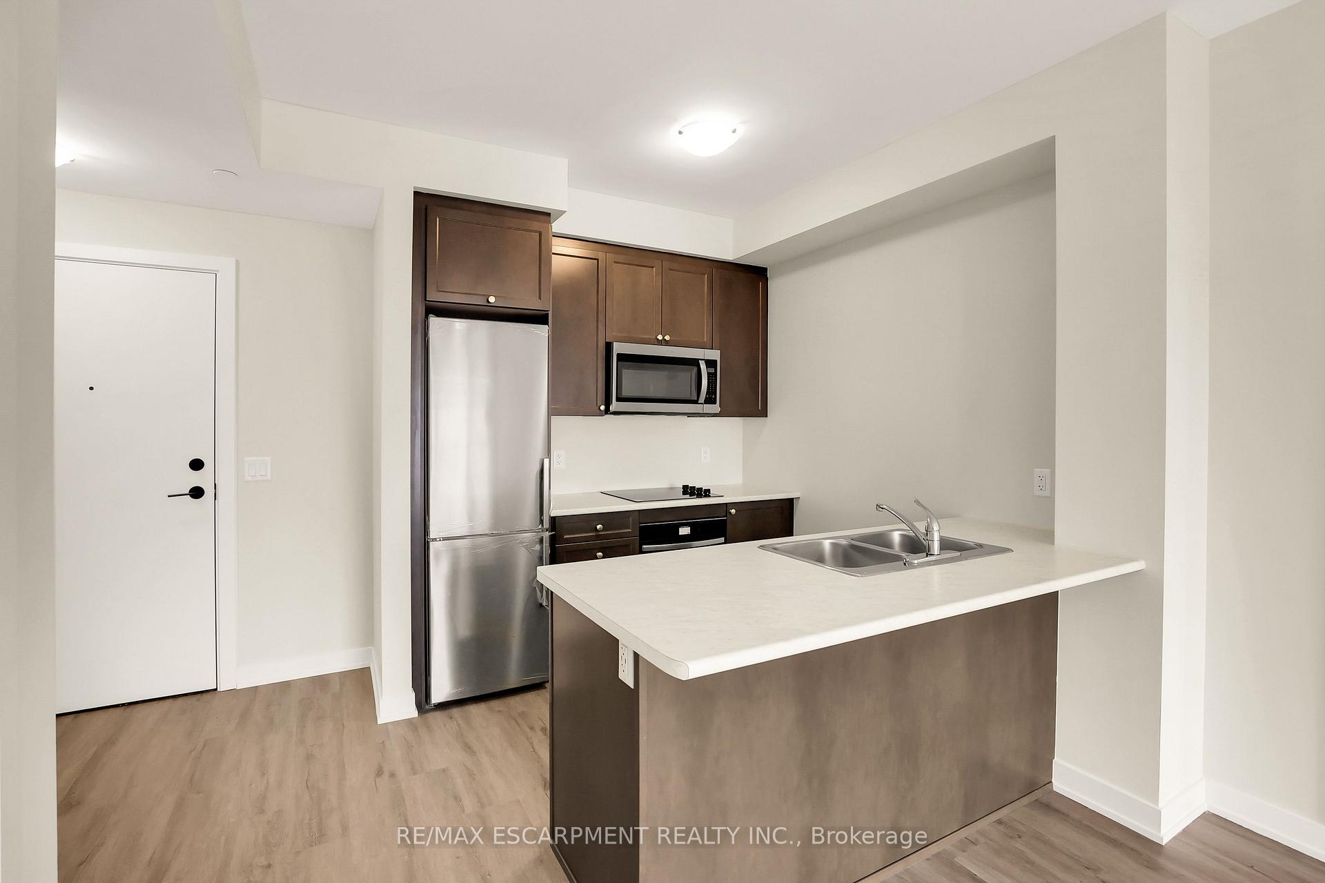 Photo 8 of Unit 412, 600 North Service Road, Hamilton, Lakeshore — HOMEH