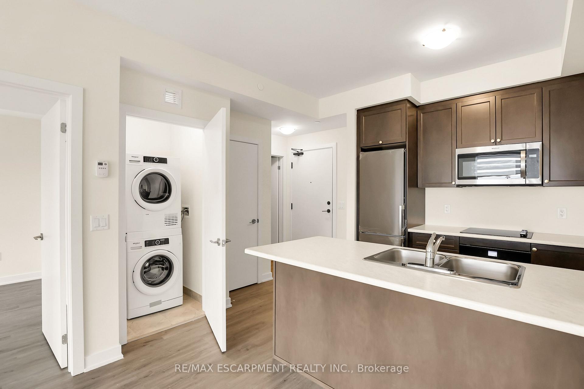 Photo 9 of Unit 412, 600 North Service Road, Hamilton, Lakeshore — HOMEH
