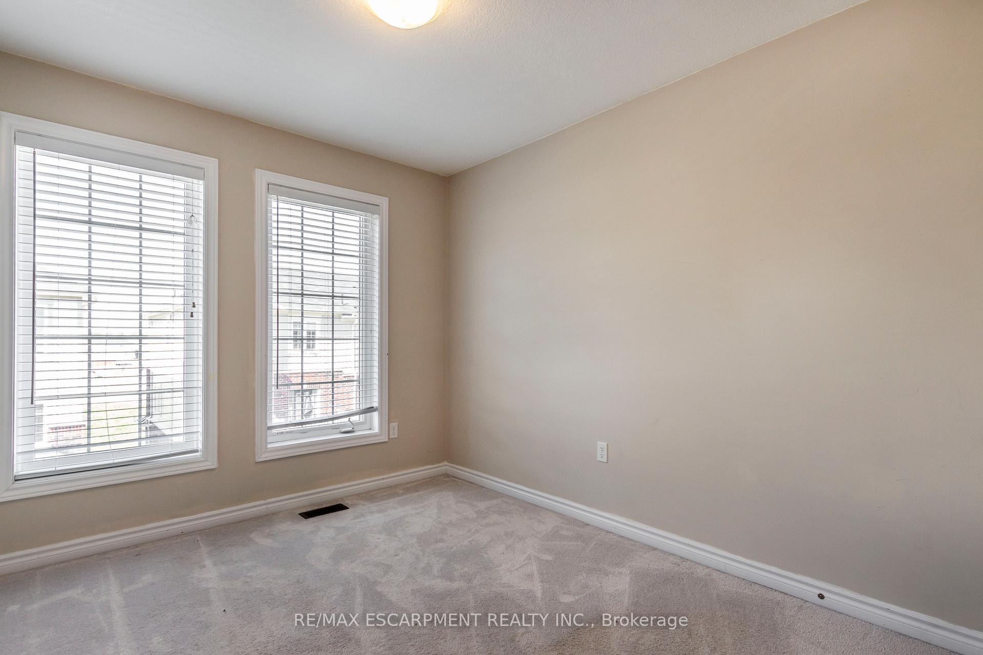Photo 24 of Unit 27, 88 Decorso Drive, Guelph, Kortright East — HOMEH