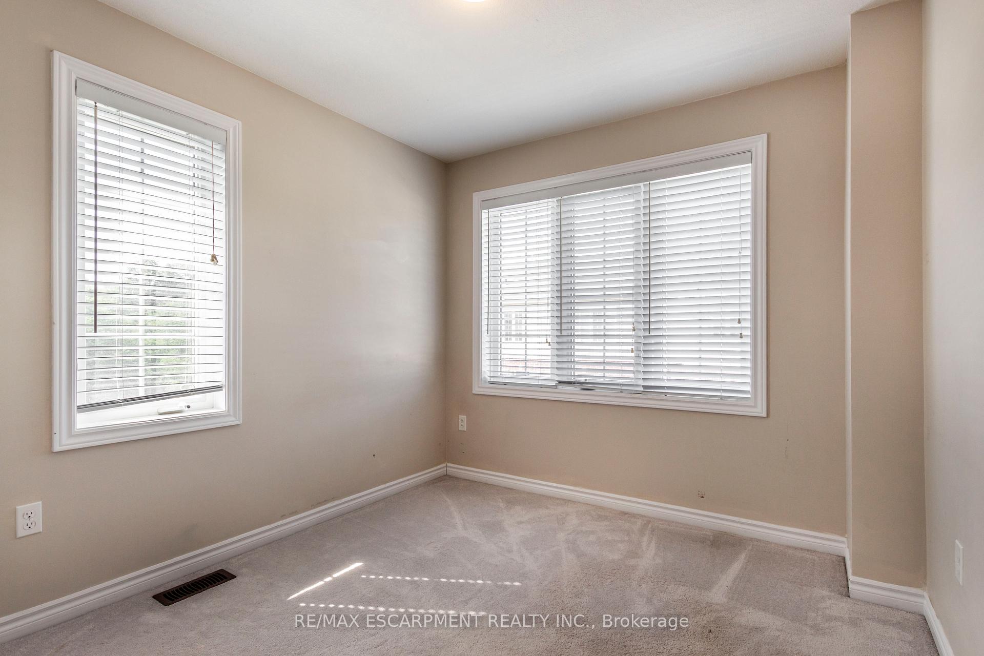Photo 27 of Unit 27, 88 Decorso Drive, Guelph, Kortright East — HOMEH