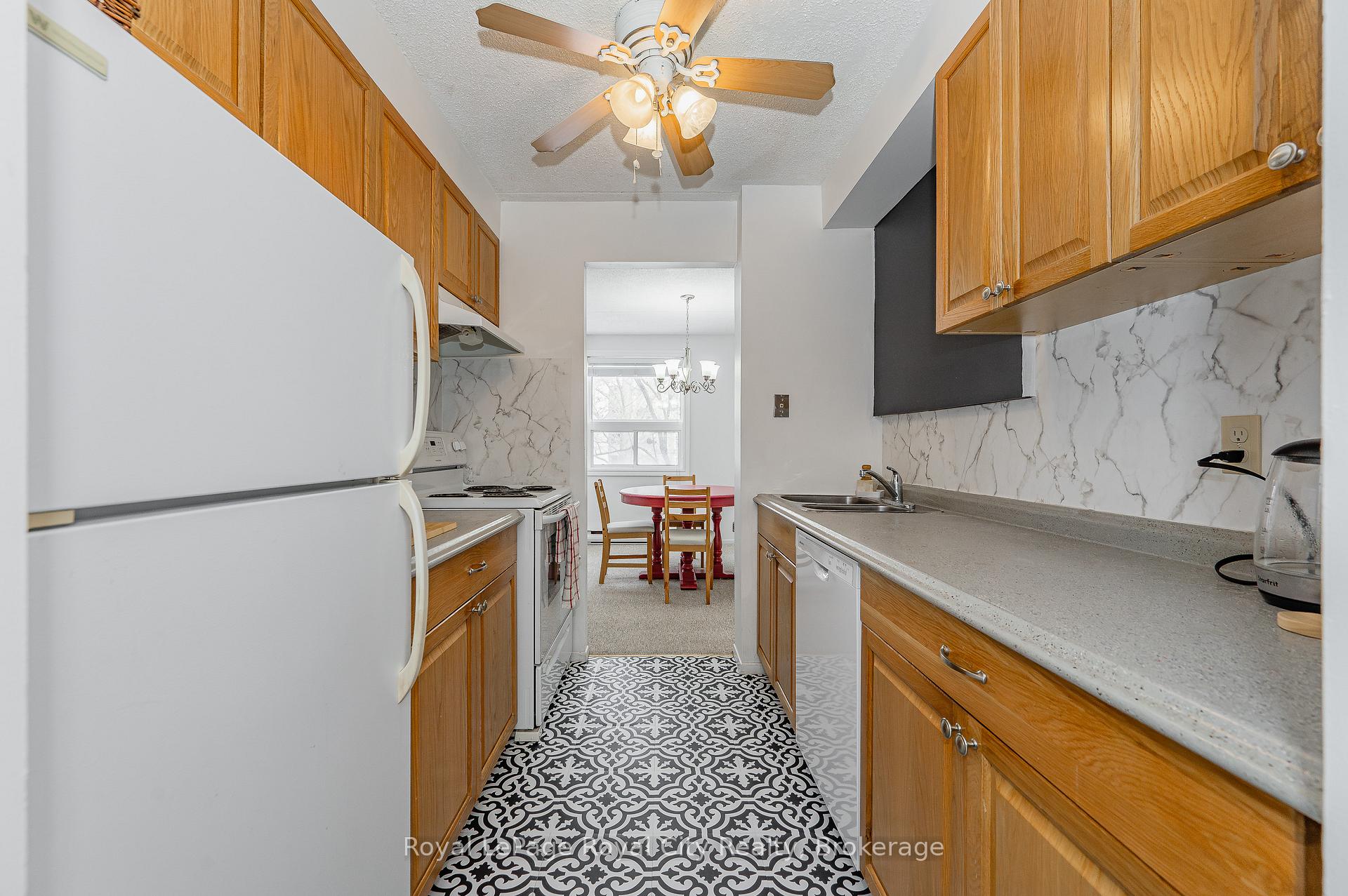 Photo 23 of Unit 210, 65 Silvercreek Parkway N, Guelph, Junction/Onward Willow — HOMEH