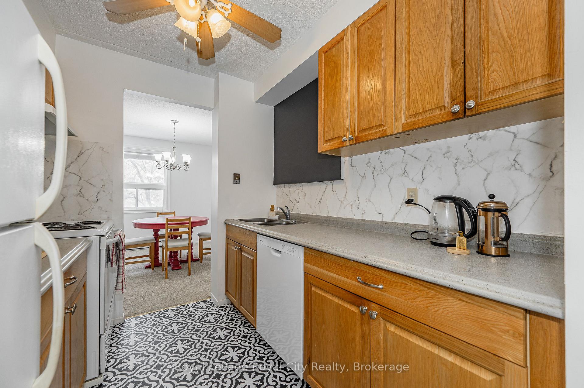 Photo 24 of Unit 210, 65 Silvercreek Parkway N, Guelph, Junction/Onward Willow — HOMEH