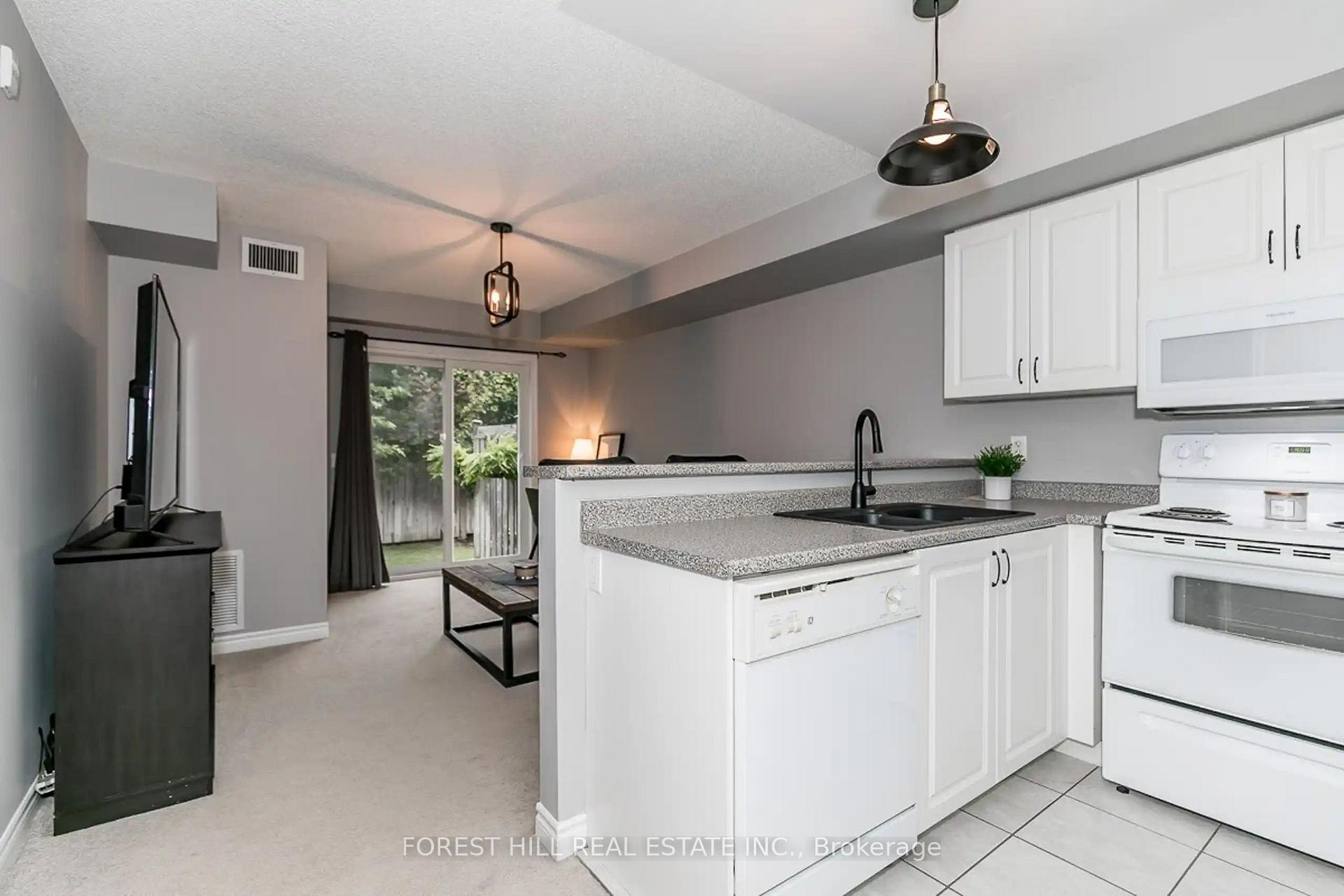 Photo 2 of Unit 1, 139 Sydenham Wells, Barrie, Georgian Drive — HOMEH