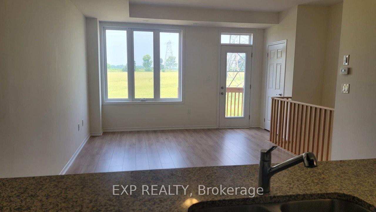Photo 4 of Unit 27, 2663 Magdalen Path, Oshawa, Windfields — HOMEH