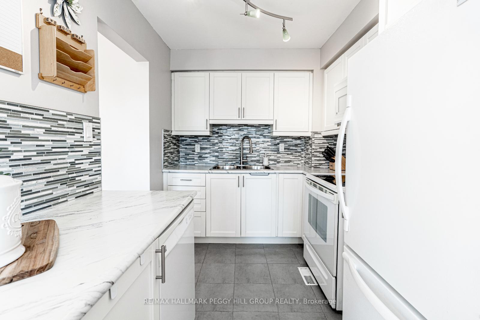 Photo 7 of Unit 15, 52 Adelaide Street, Barrie, Allandale — HOMEH